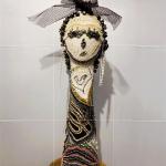 HER beaded assemblage