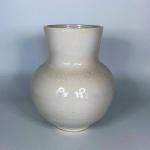 #* Flat bottomed white vase