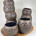 Dark luminaries with blue interior, assorted sizes